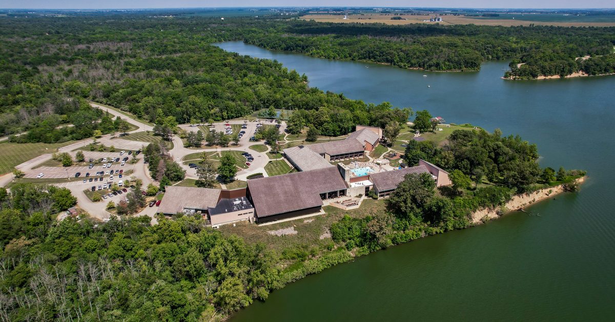 An aerial view of the lake and deer creek property